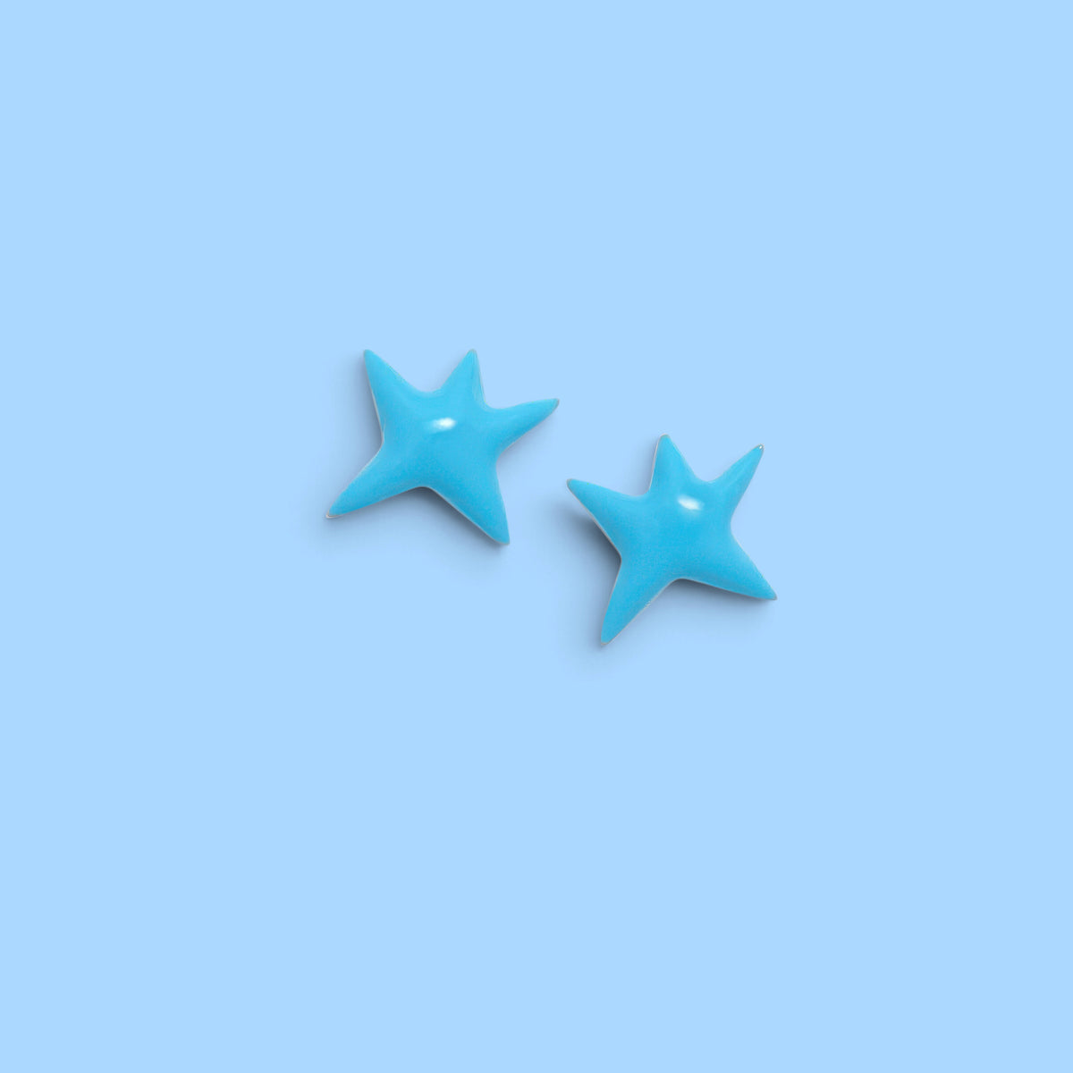 BOUCLES D'OREILLES EN FORME D'ÉTOILE