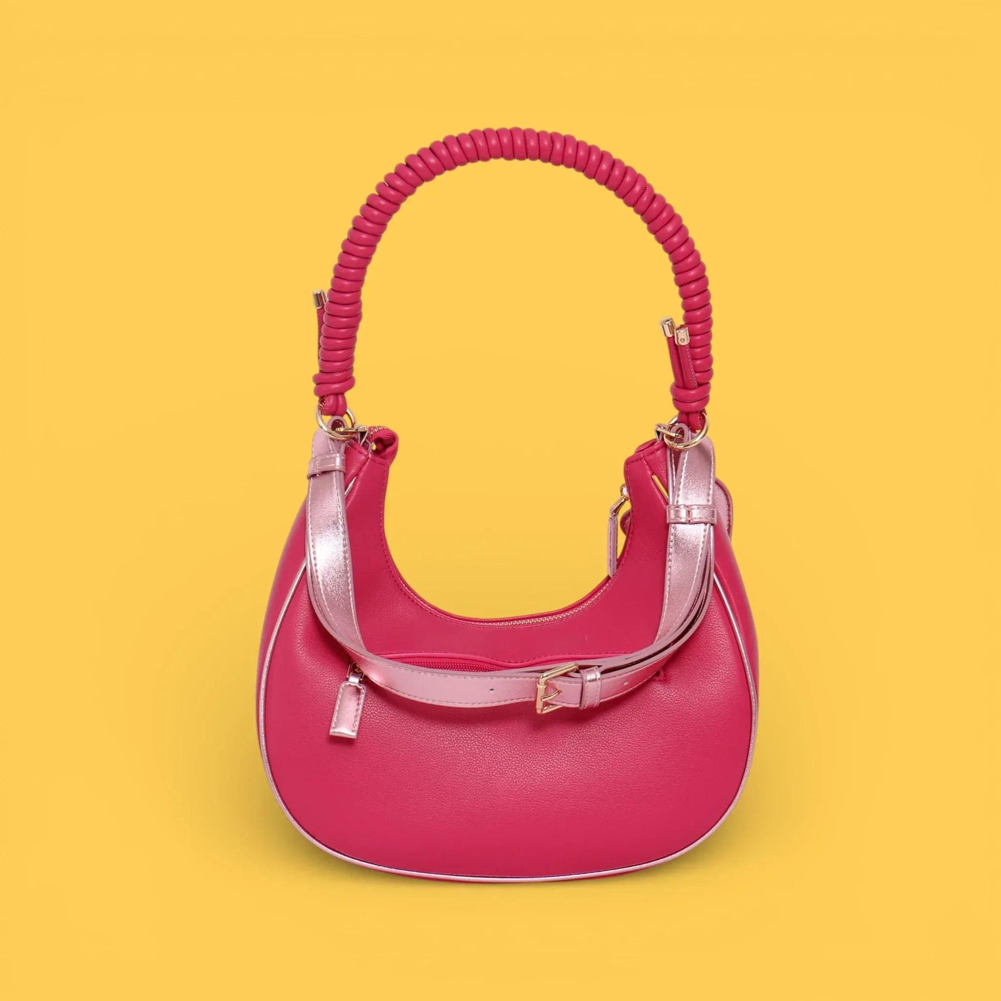 Bolso gondola rosa fucsia con asa de cordón trenzado y hebilla metálica superior