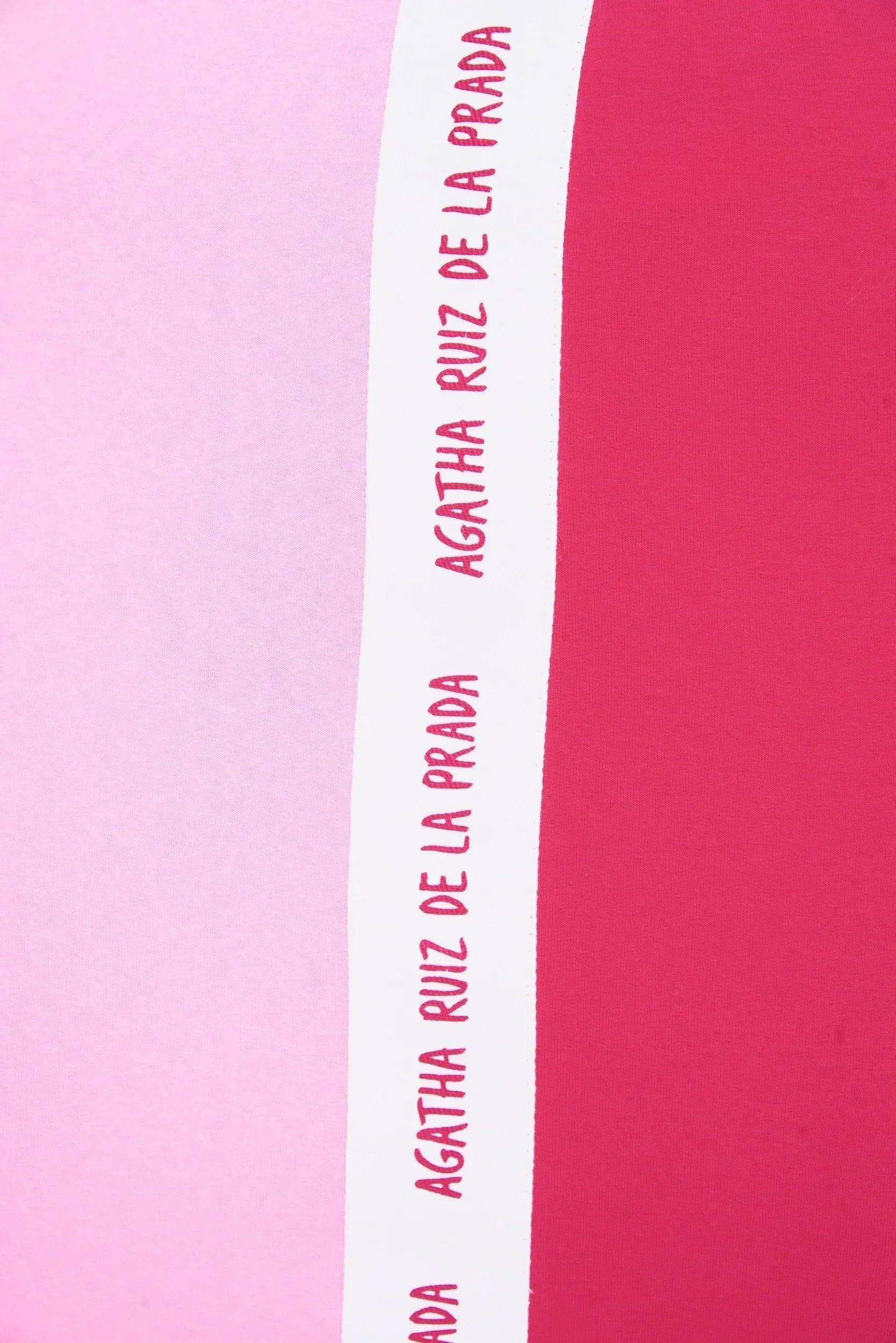Franja vertical con texto en la falda bicolor rosa y fucsia