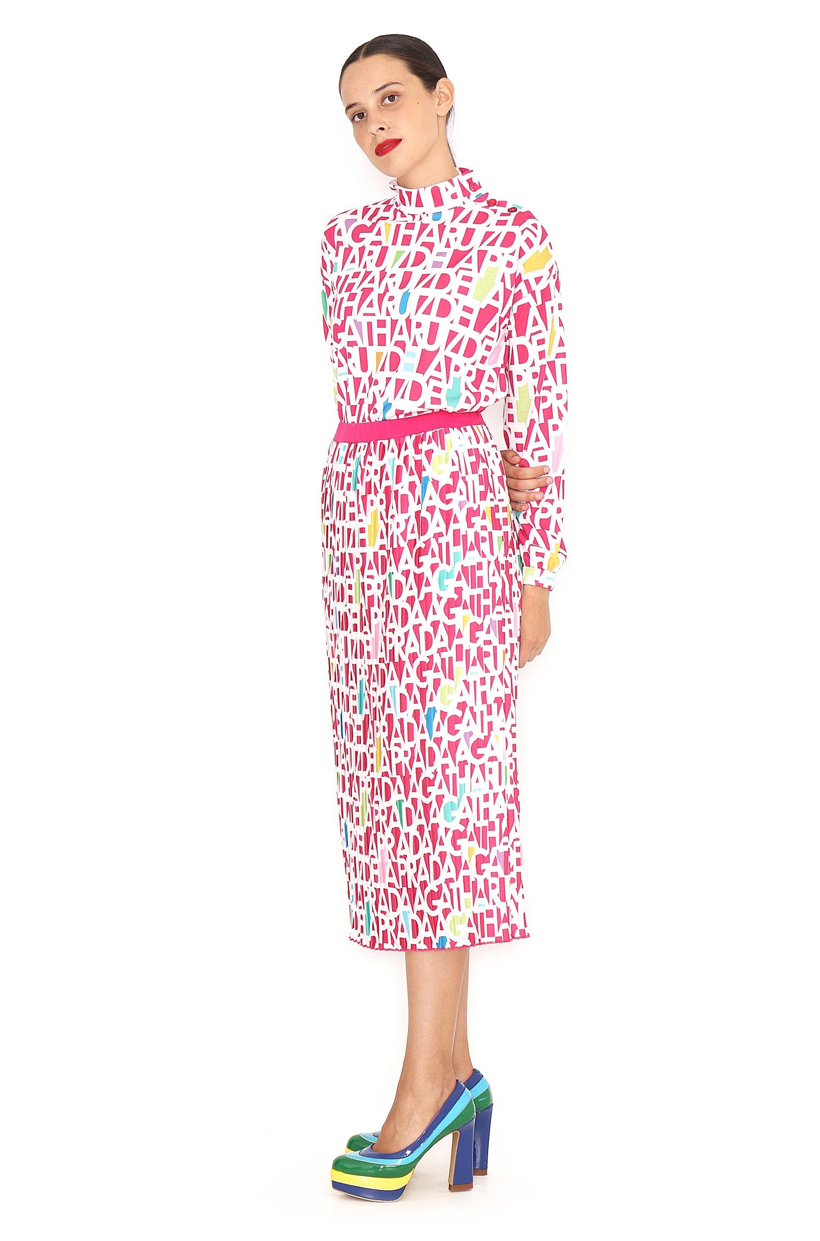 FALDA PLISADA LETRAS