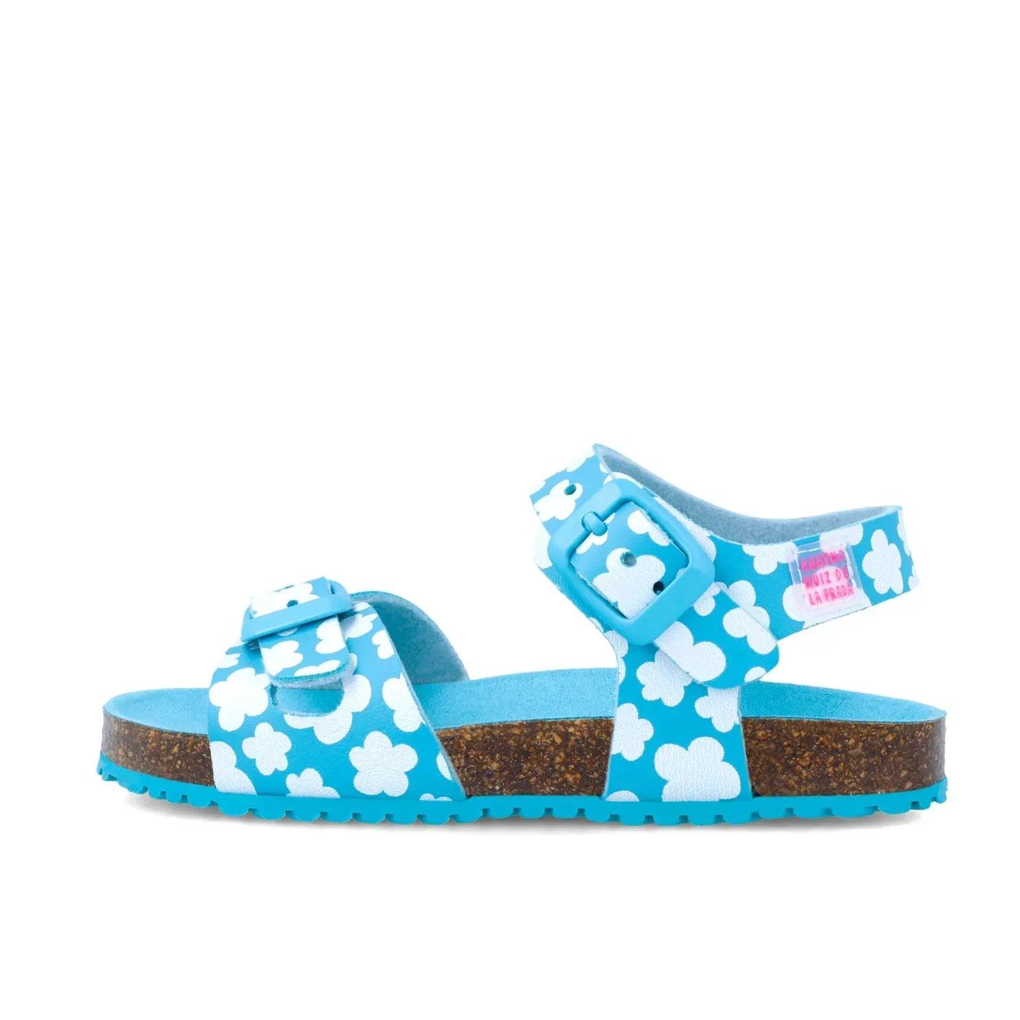 Sandalias bio con tiras azules estampadas con flores blancas y suela de corcho