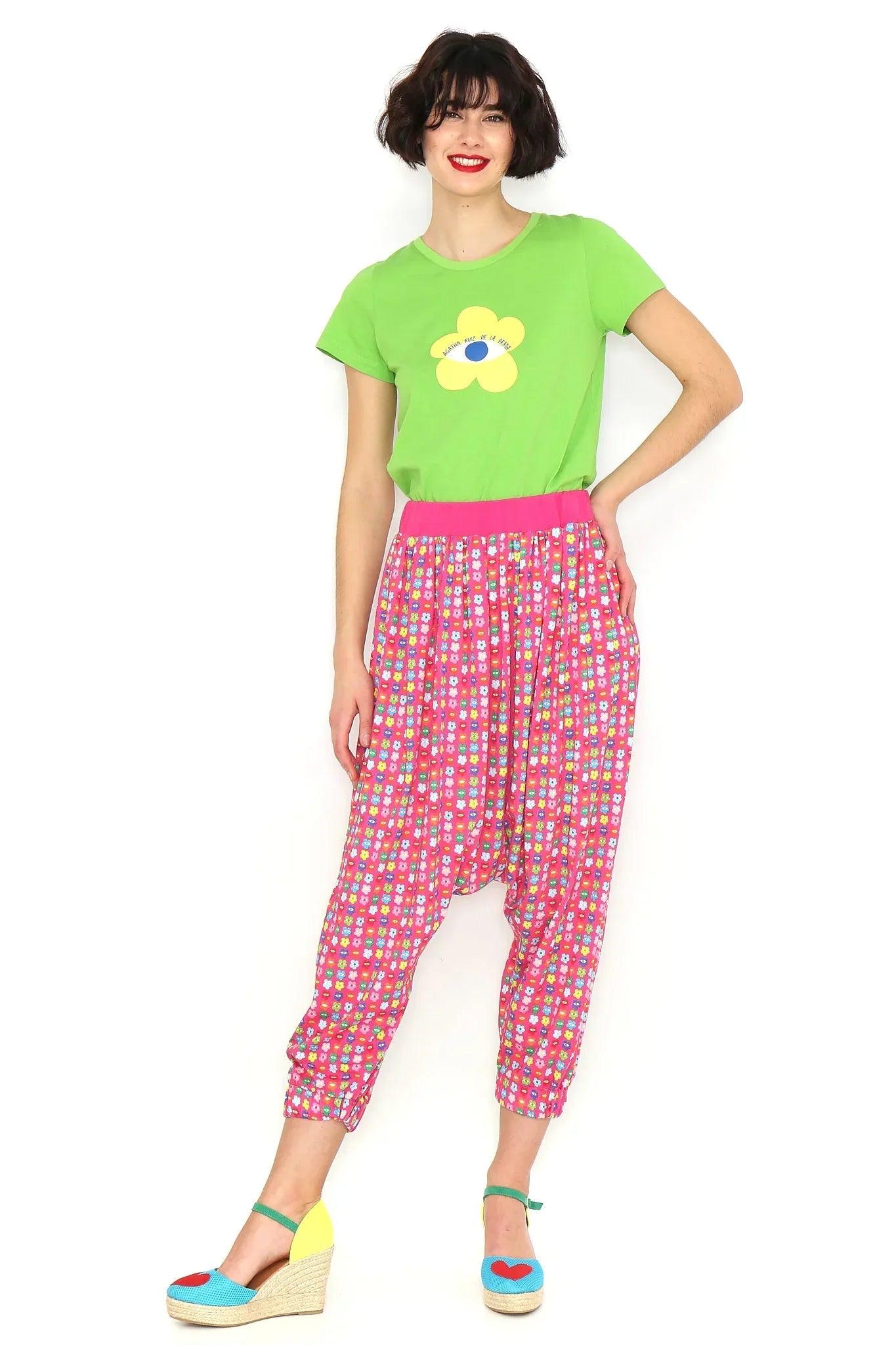 Pantalón estampado tiro bajo, cintura elástica y pierna entallada, patrón rosa y rojo