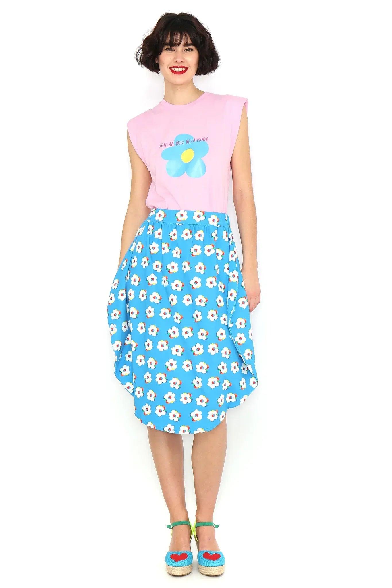 Falda circular azul con estampado de flores blancas y cintura elástica, media pierna