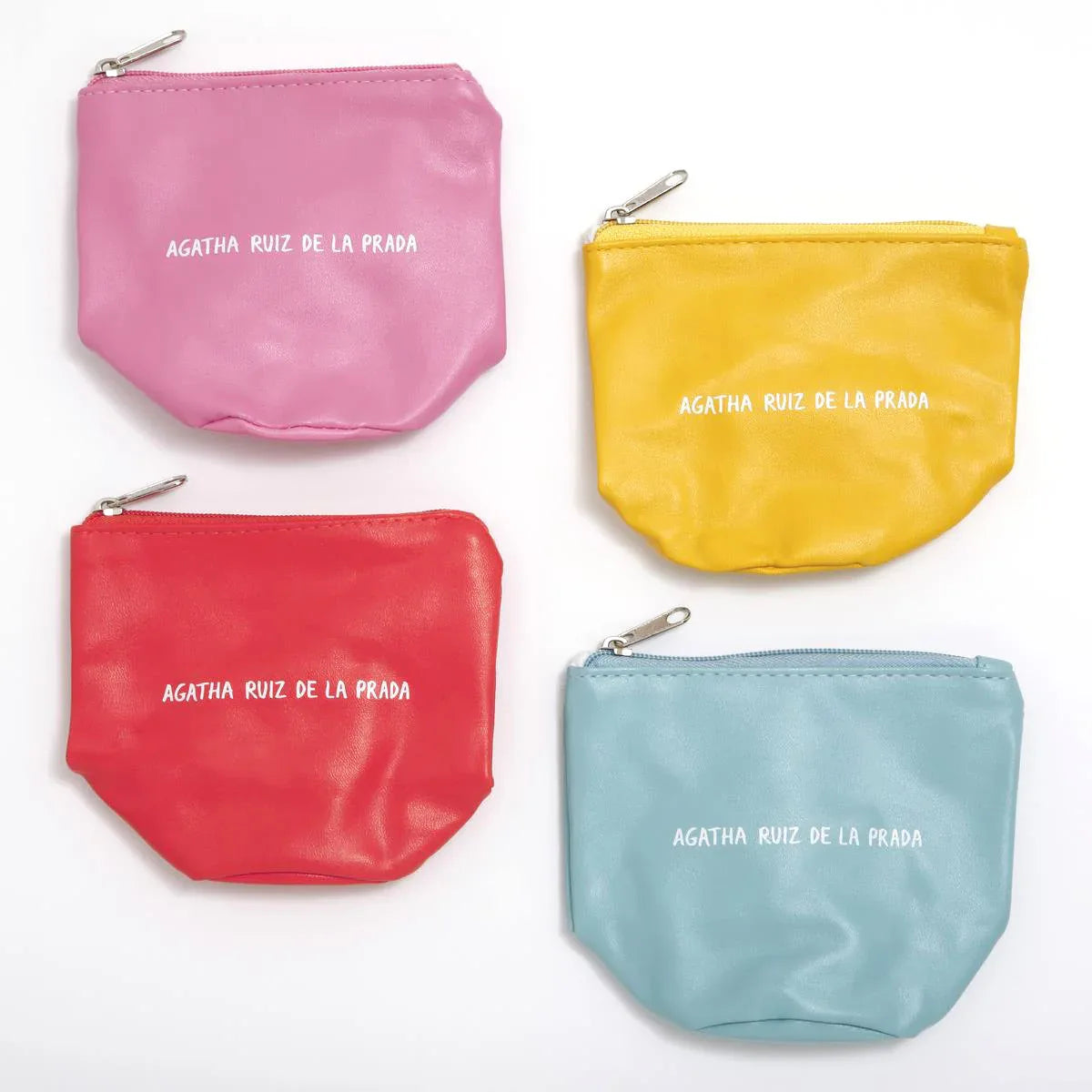 Conjunto de monederos de Agatha Ruiz de la Prada en rosa, amarillo, rojo y azul