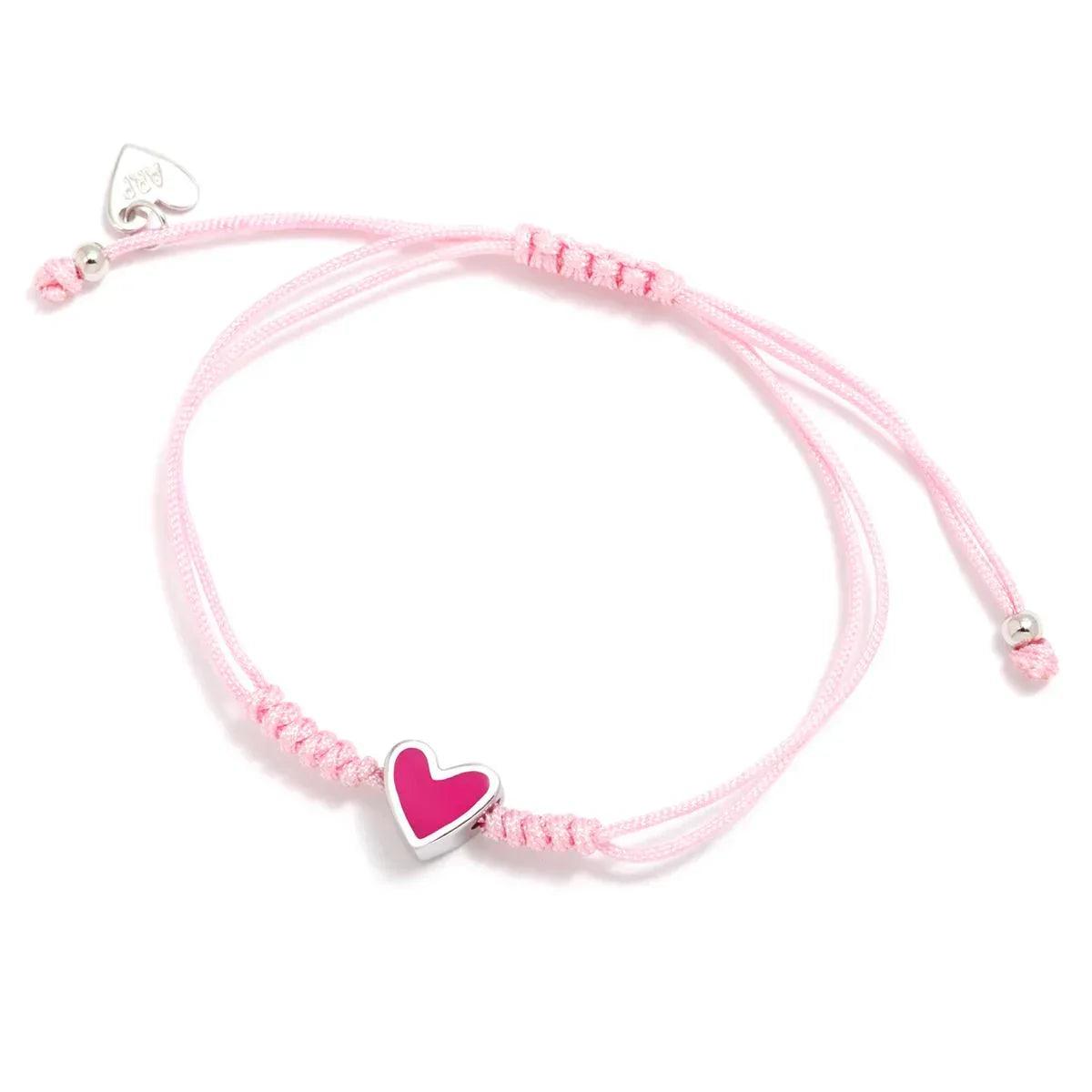 Pulsera con colgante de corazón rosa en hilo ajustable