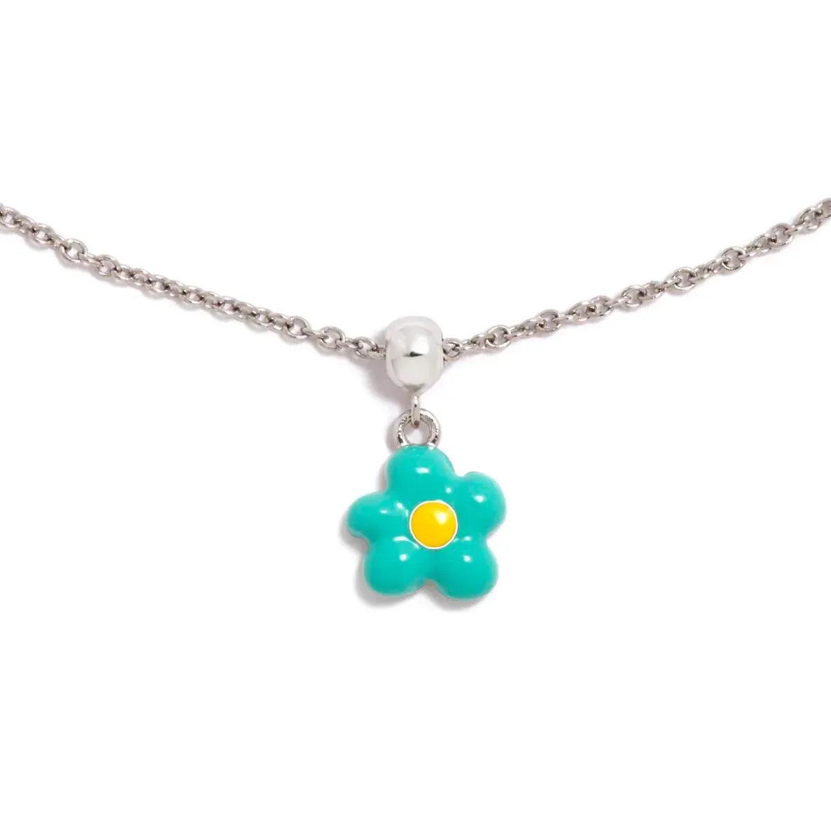 Charm flor turquesa con dije flor y centro amarillo; con cadena plateada
