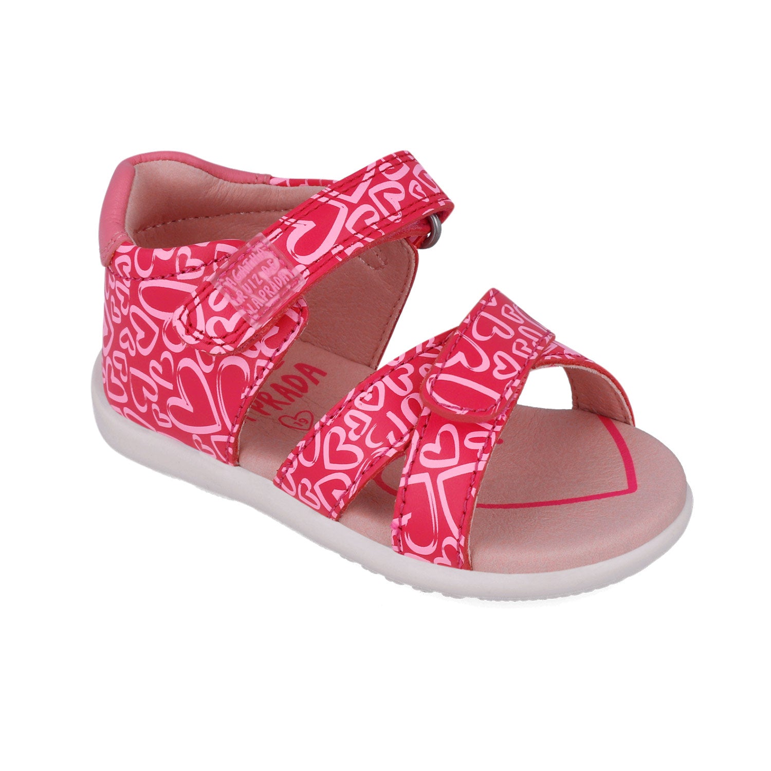 Sandalias fucsia estampadas con tira frontal cruzada y suela blanca antideslizante.