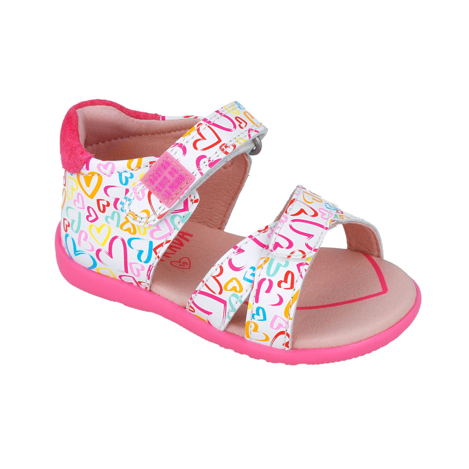 Sandalia infantil estampada con talón rojo y tiras con hebilla, suela fucsia.