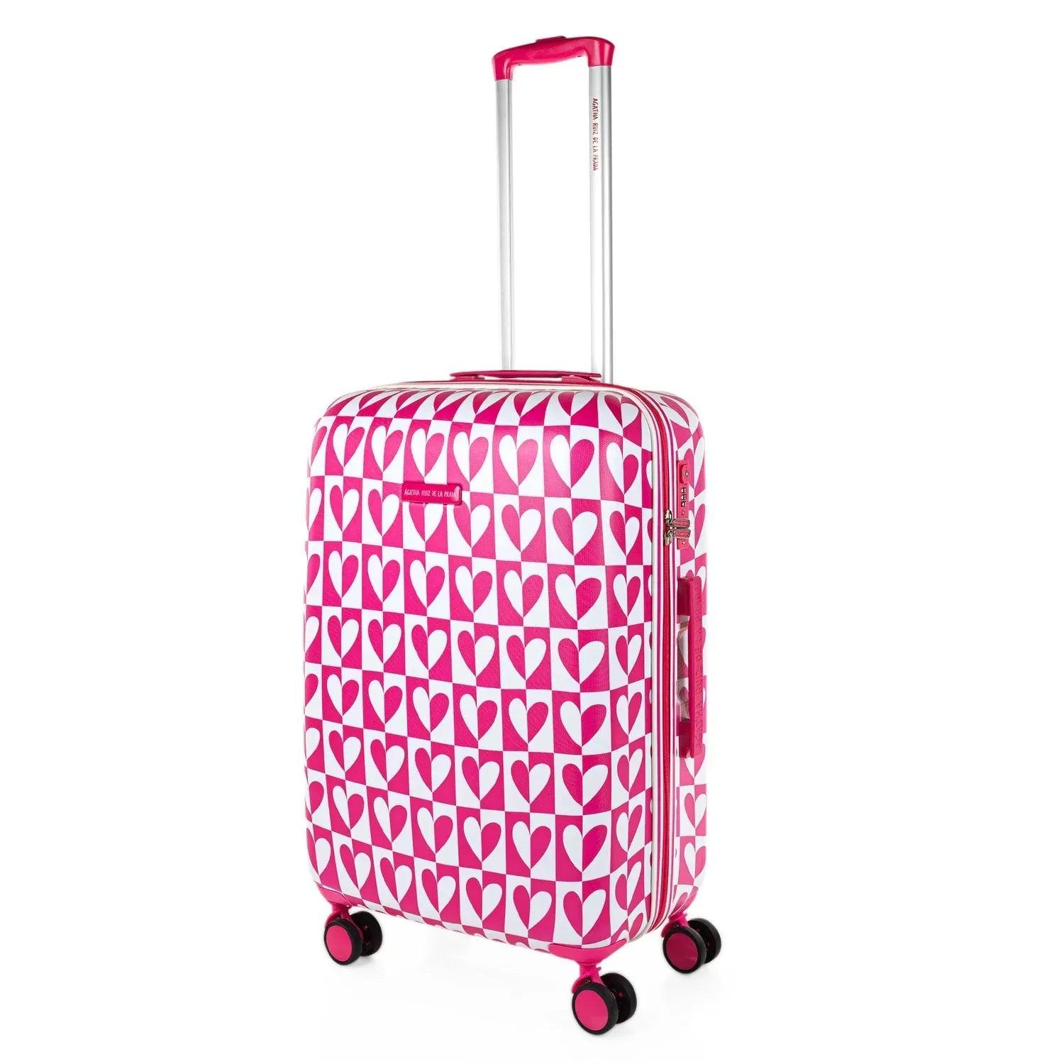 Maleta rígida 60L con asa extensible, ruedas y estampado de corazones fucsia y blanco
