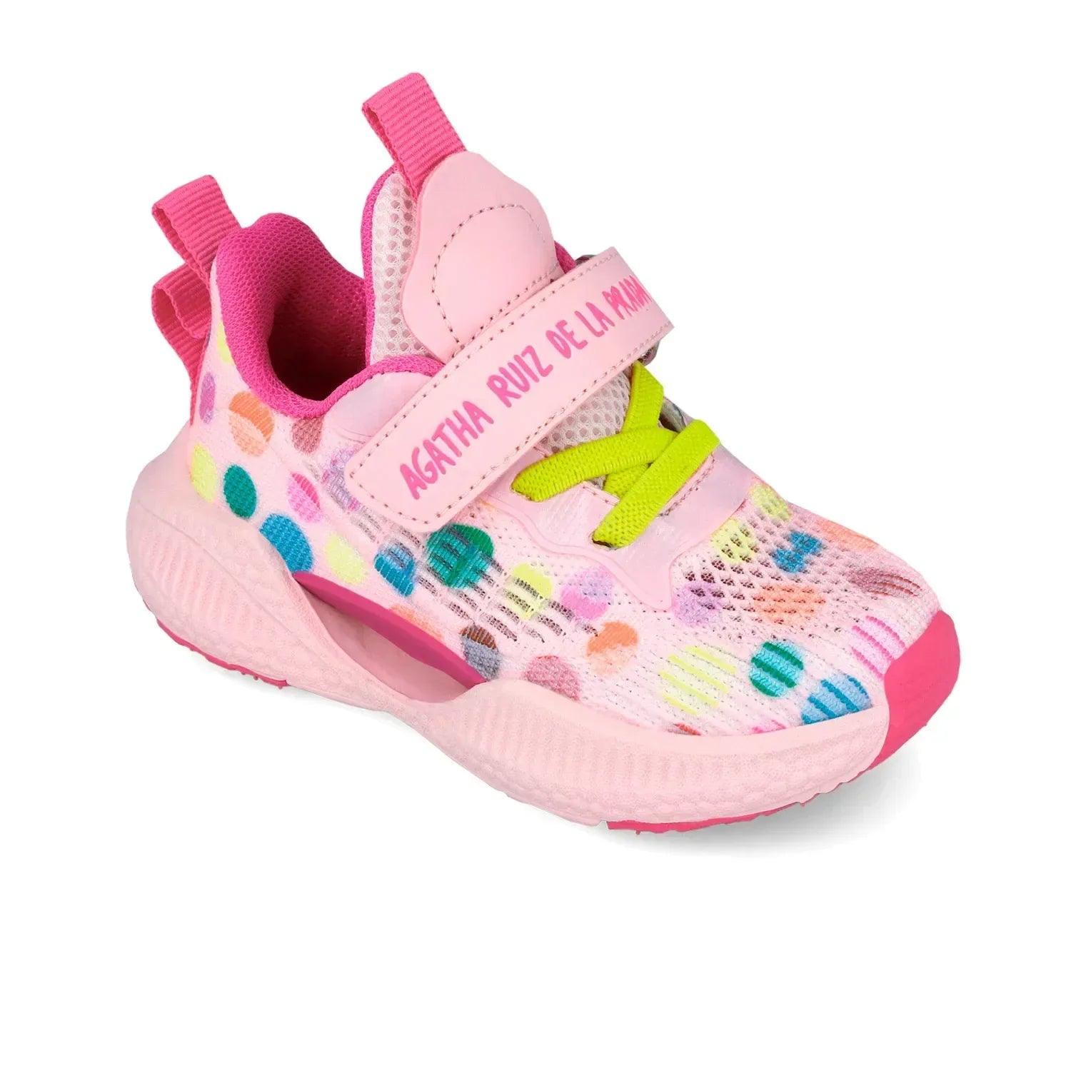 Zapatilla deportiva rosa con puntos multicolor y tiras con velcro, suela con relieve