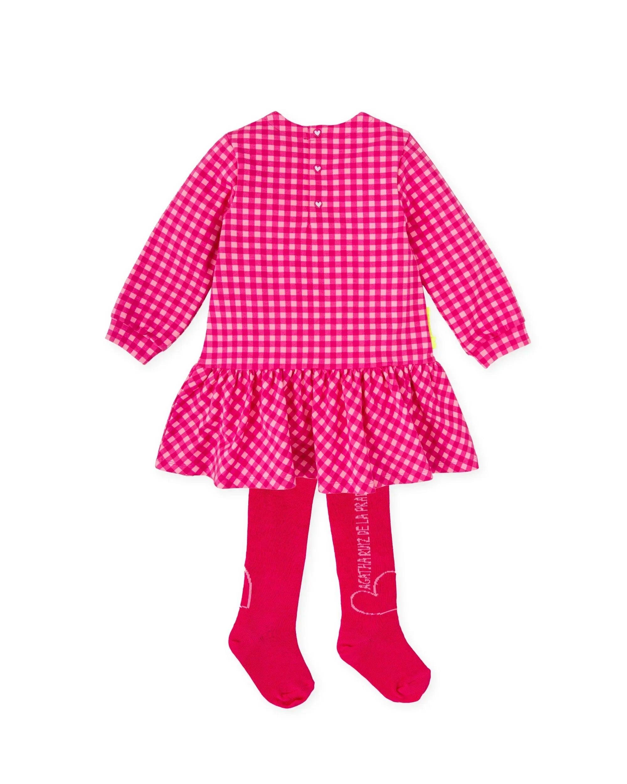 Vestido infantil de cuadros fucsia con volante en la falda y leotardos rojos a juego