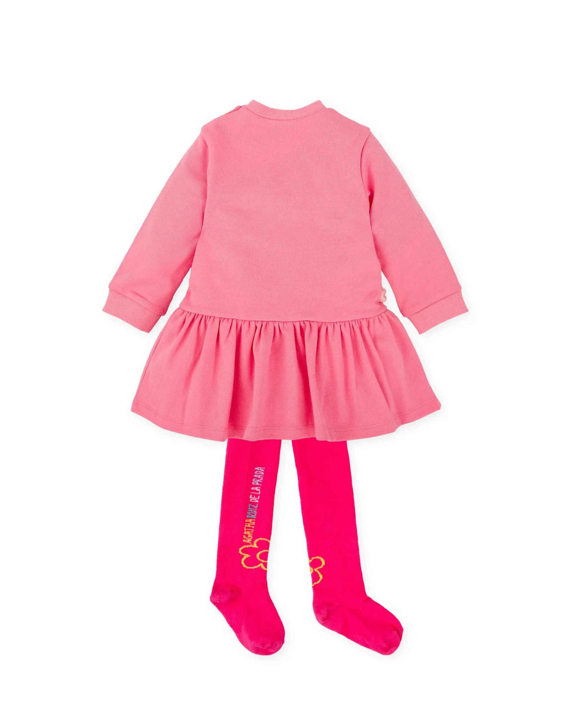 Vestido rosa vista trasera con volante en la falda y leotardos a juego
