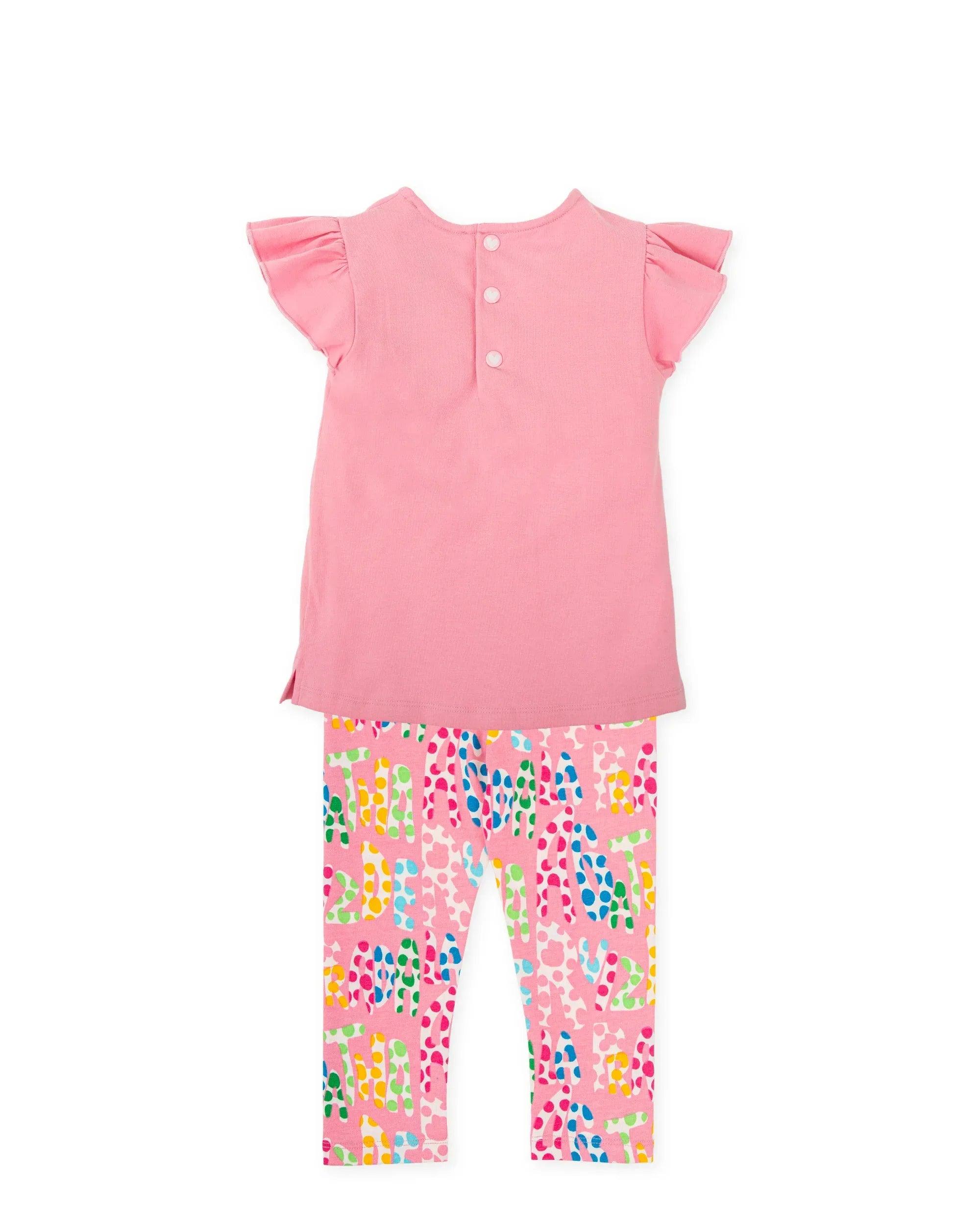 Conjunto: camiseta rosa de botones y leggings estampados con manchas de colores
