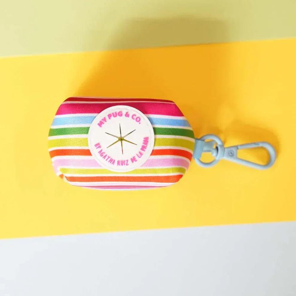 Accesorio porta bolsas rayado arcoíris con clip azul y asa