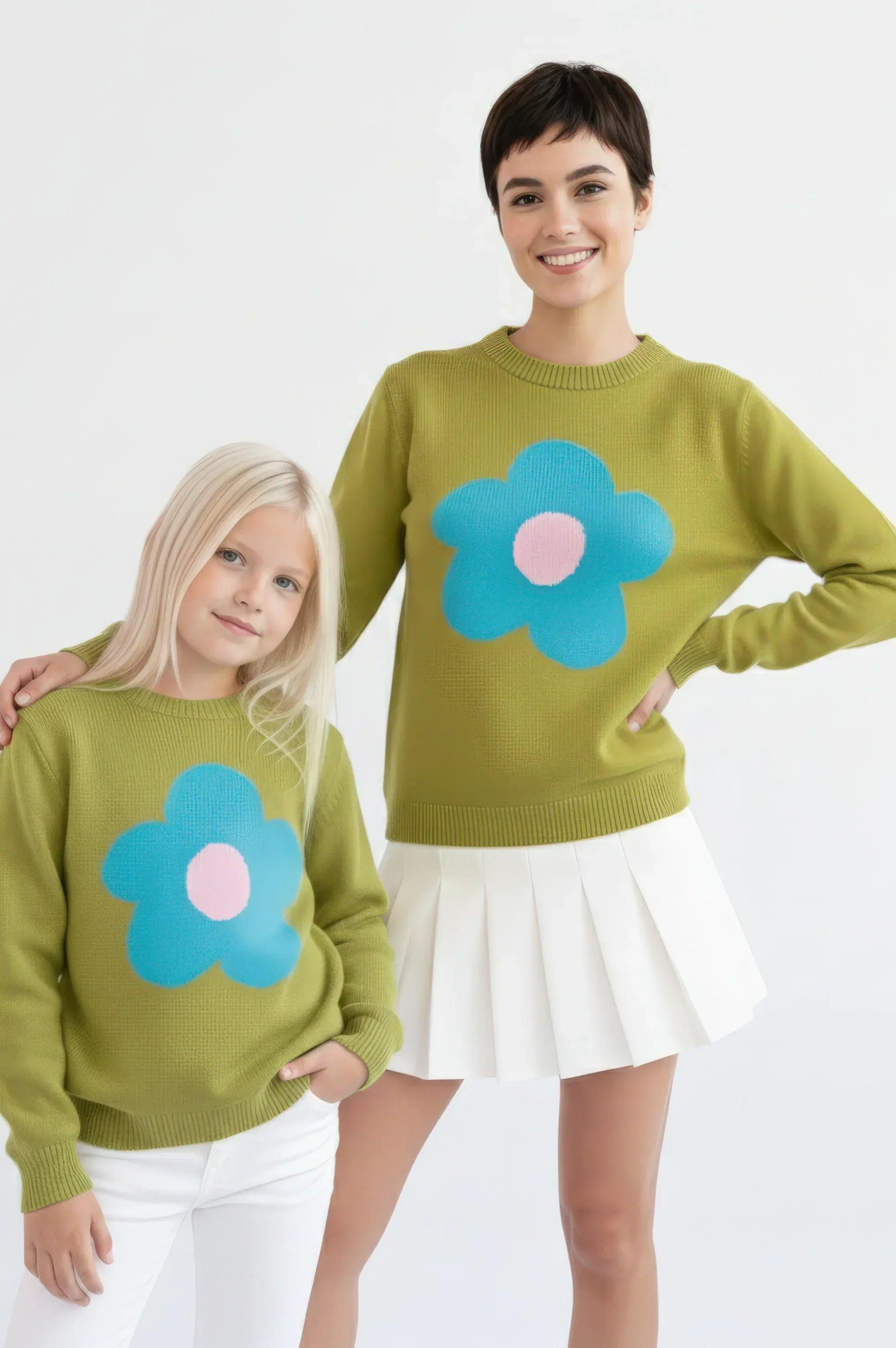 Jersey infantil verde de algodón con flor azul y rosa, estilo de punto acanalado