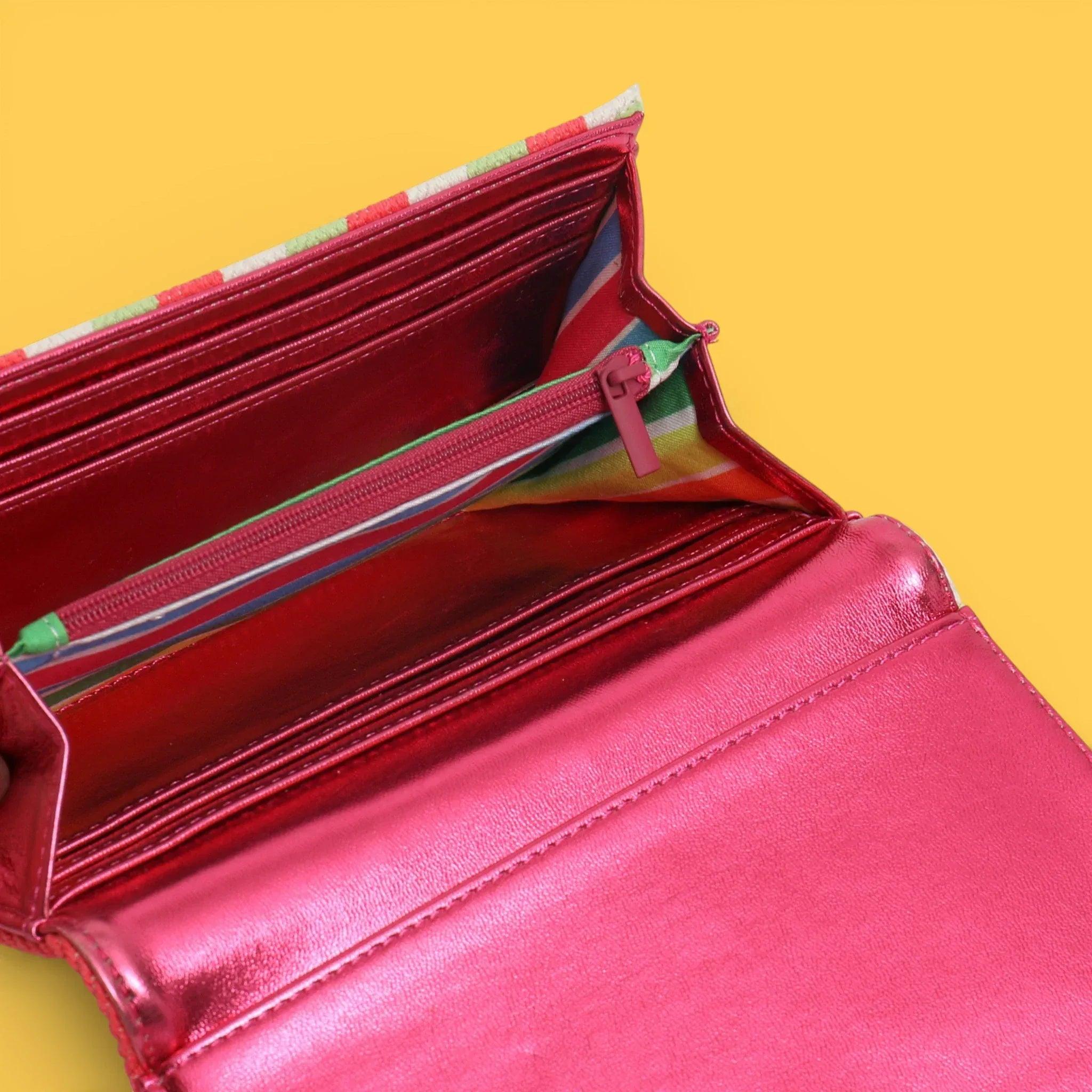 Monedero de lona con interior rojo y cremallera