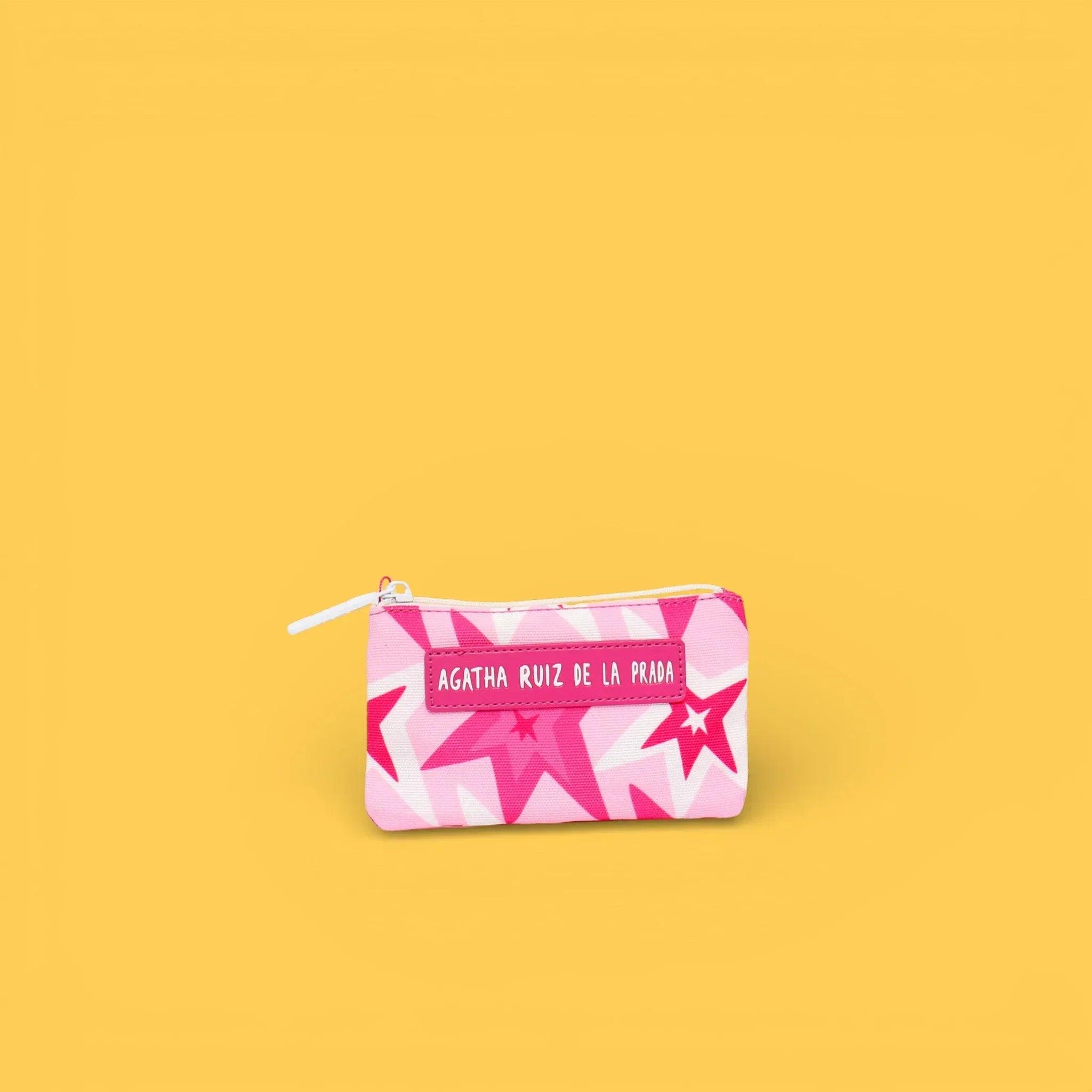 Monedero estampado rosa con estrellas y cremallera blanca.