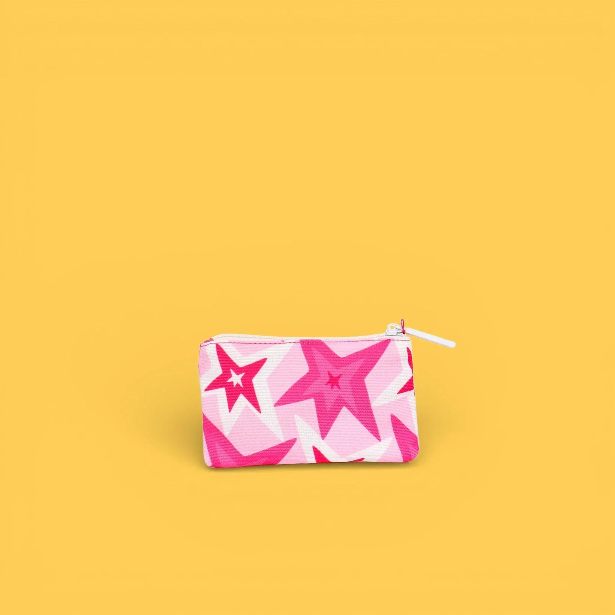 Monedero estampado rosa con estrellas grandes y cremallera.