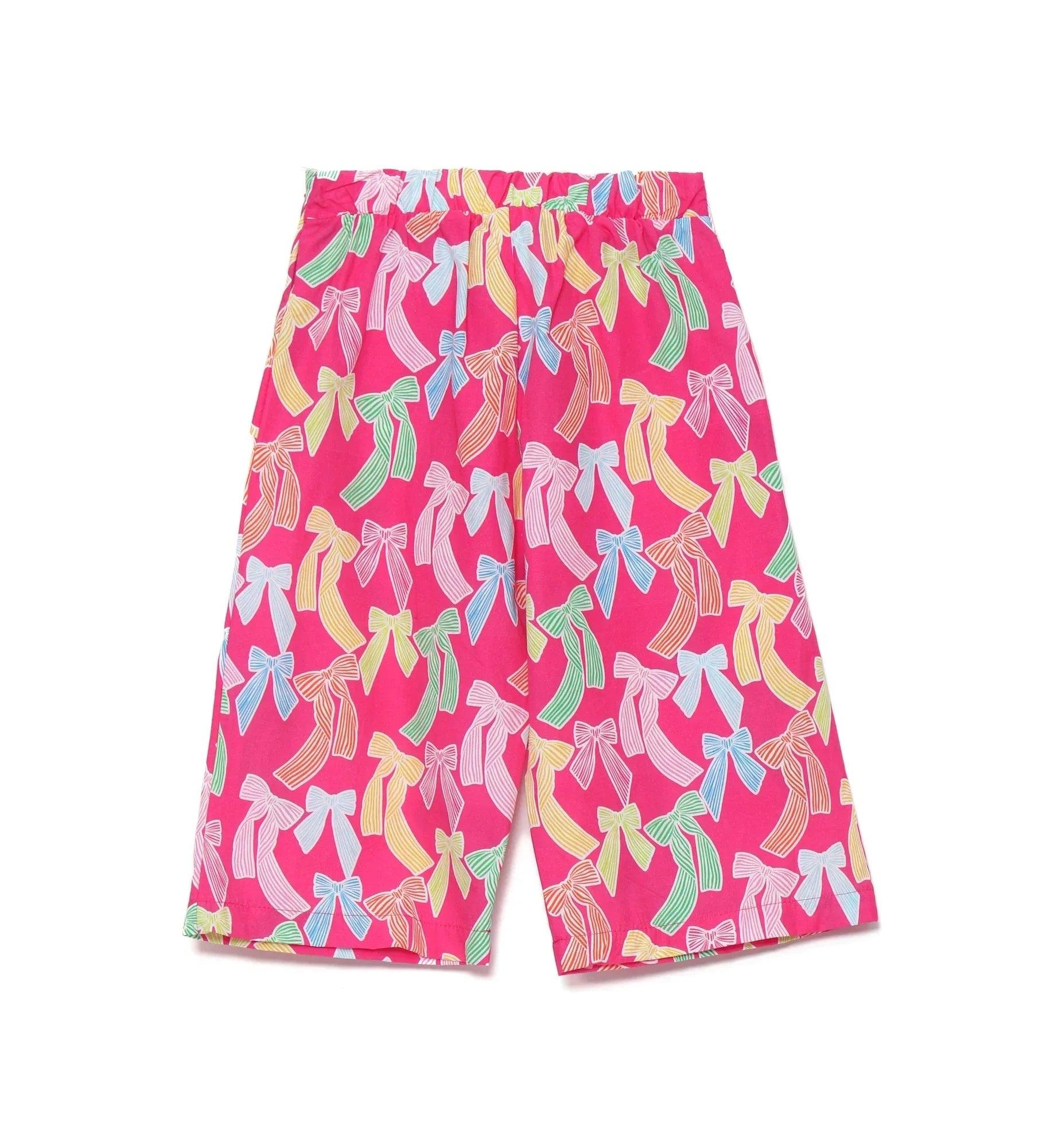 Pantalón culotte fucsia con estampado de lazos multicolor y caída recta