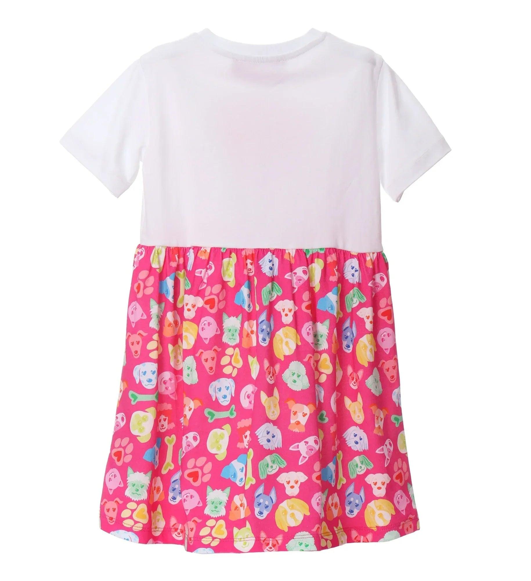 Vestido infantil blanco y fucsia con falda estampada multicolor de animales