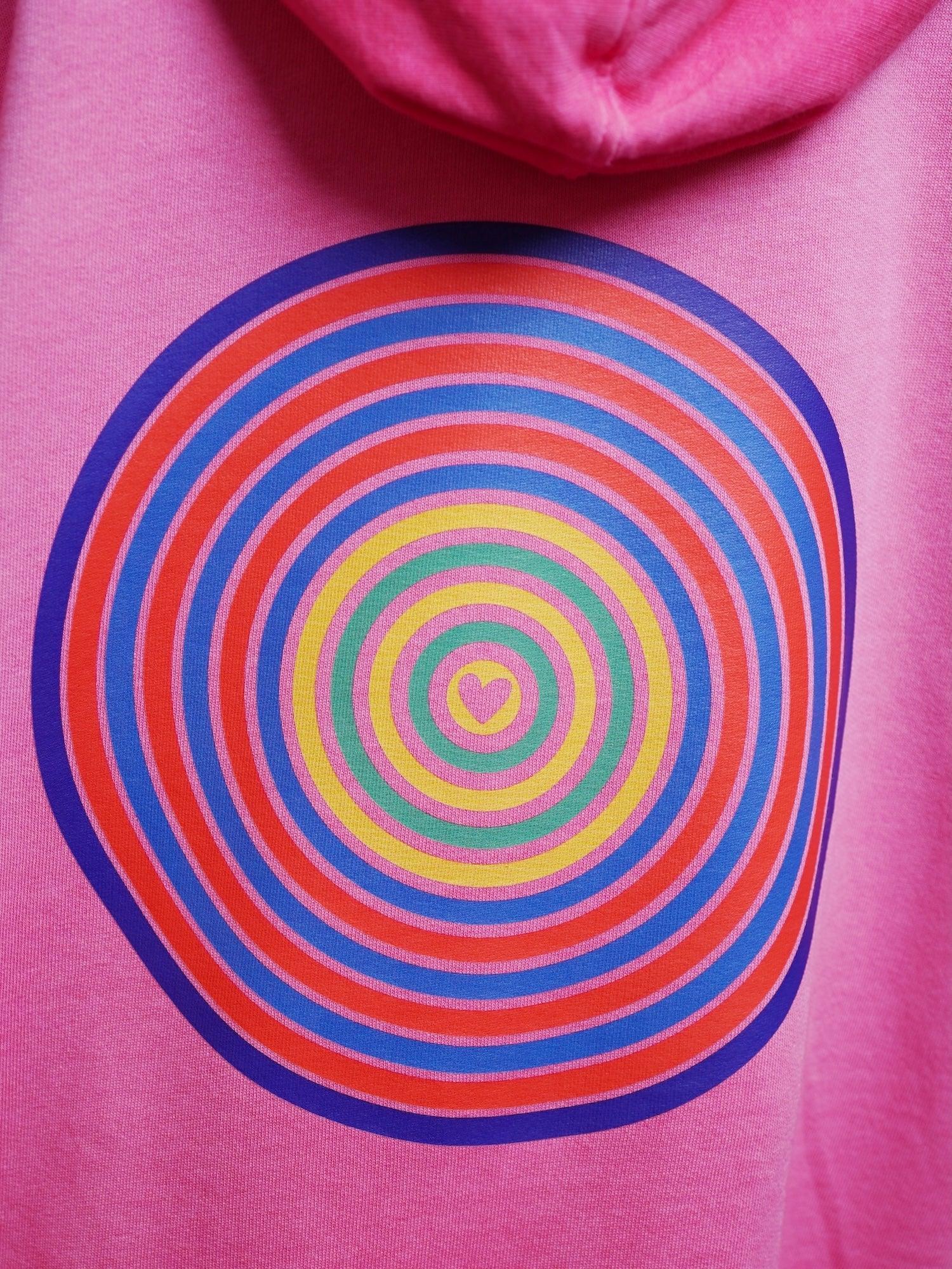 Sudadera con capucha rosa, estampado de círculos concéntricos tipo espiral
