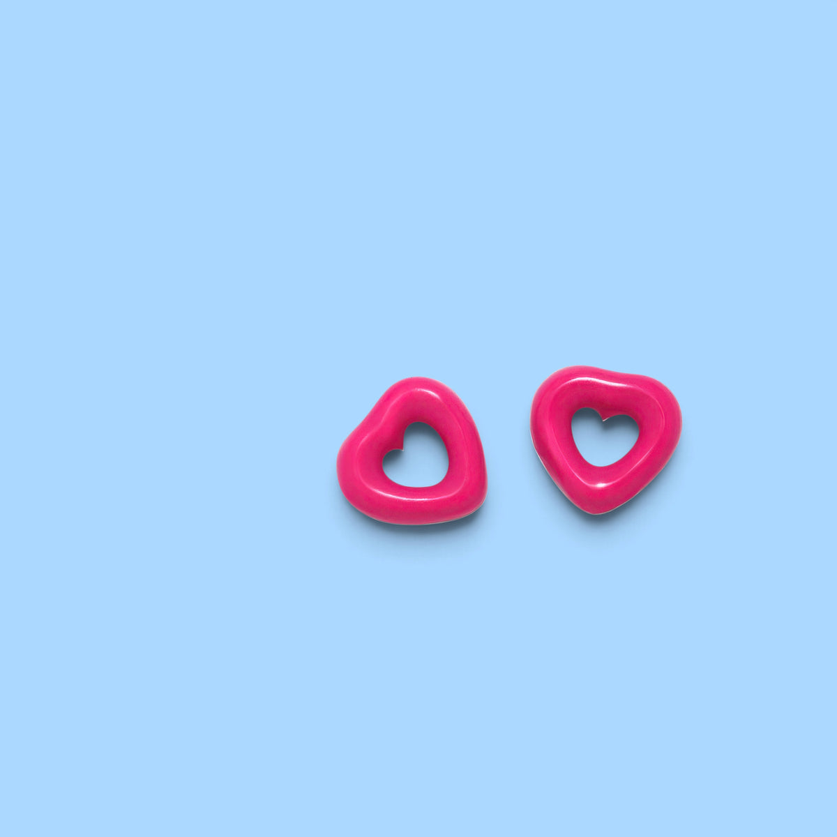 Orecchini ciambella cuore fucsia