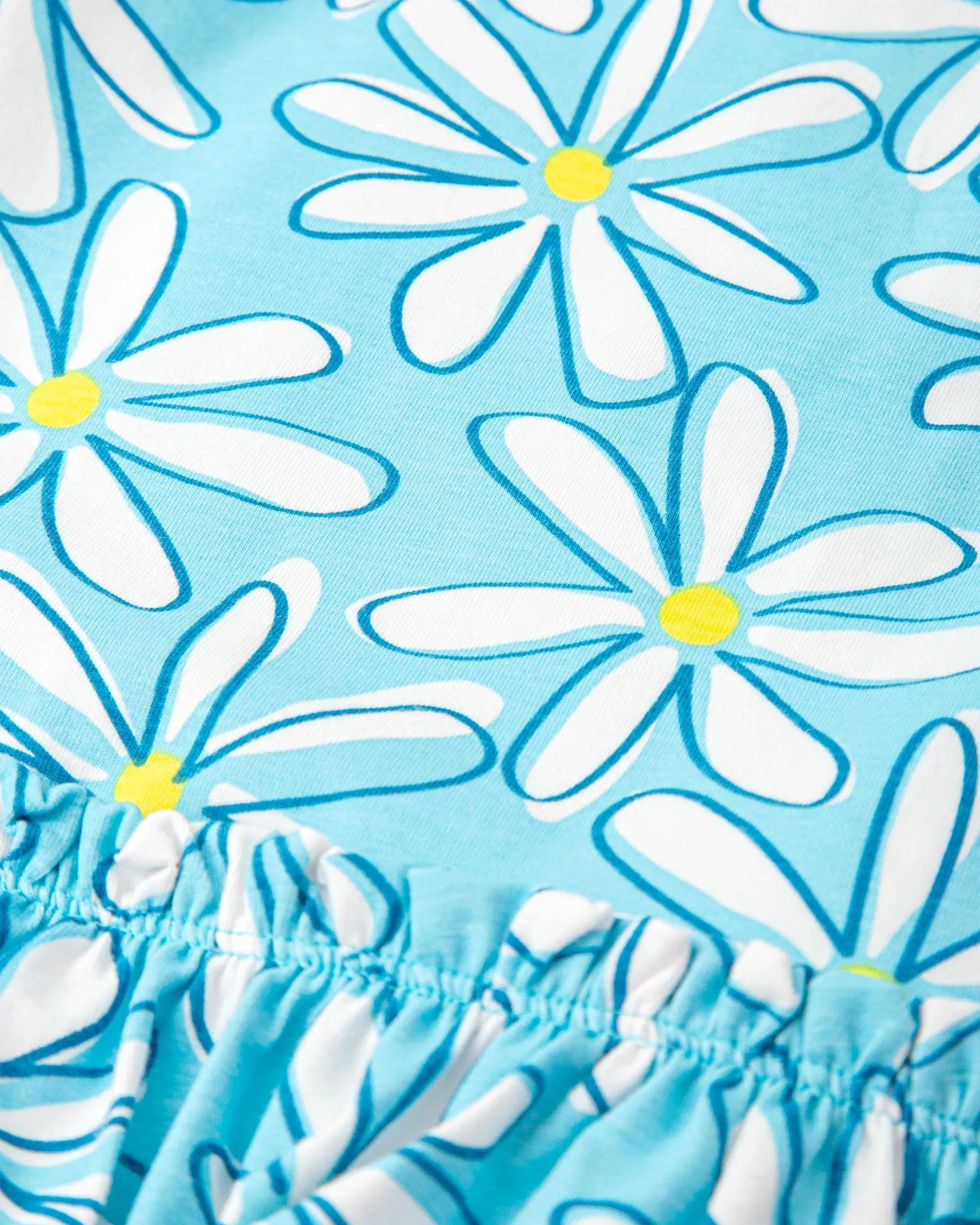 Vestido azul con estampado floral de margaritas y frunce en la parte inferior