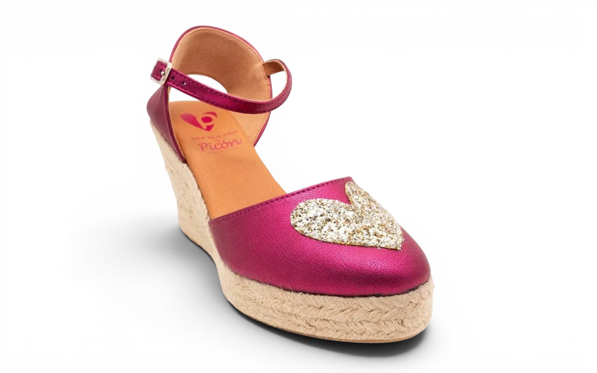 Alpargata de cuña fucsia con corazón de glitter y tira con hebilla